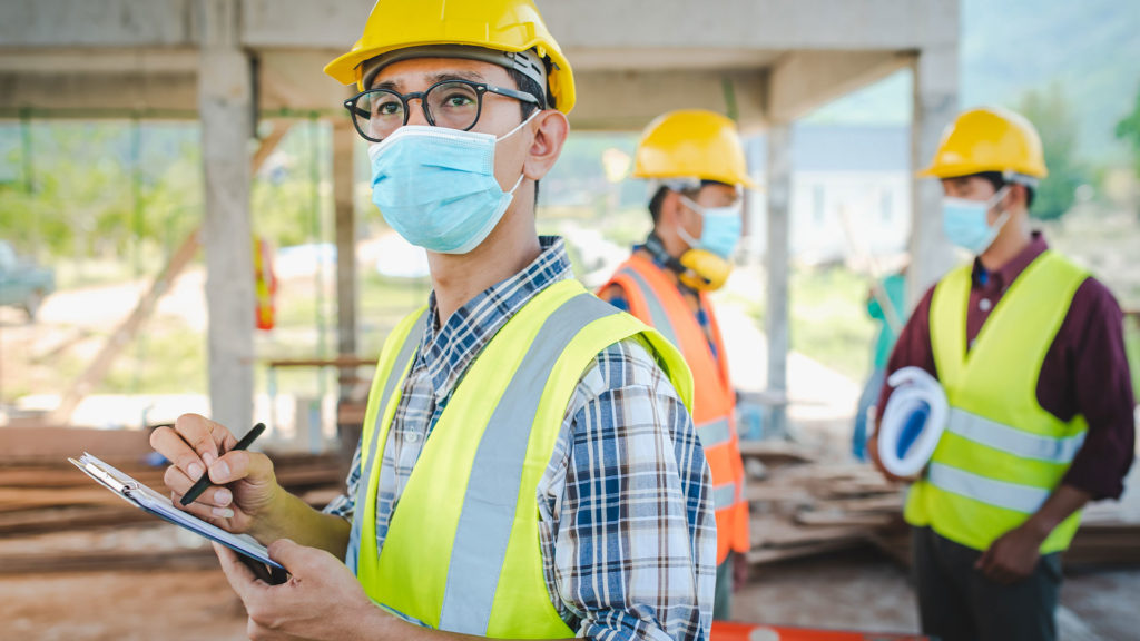 contractors working safely with face masks on sandwich ma